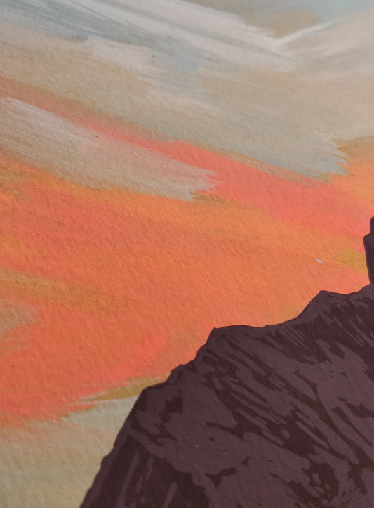 mountain painting against sunset